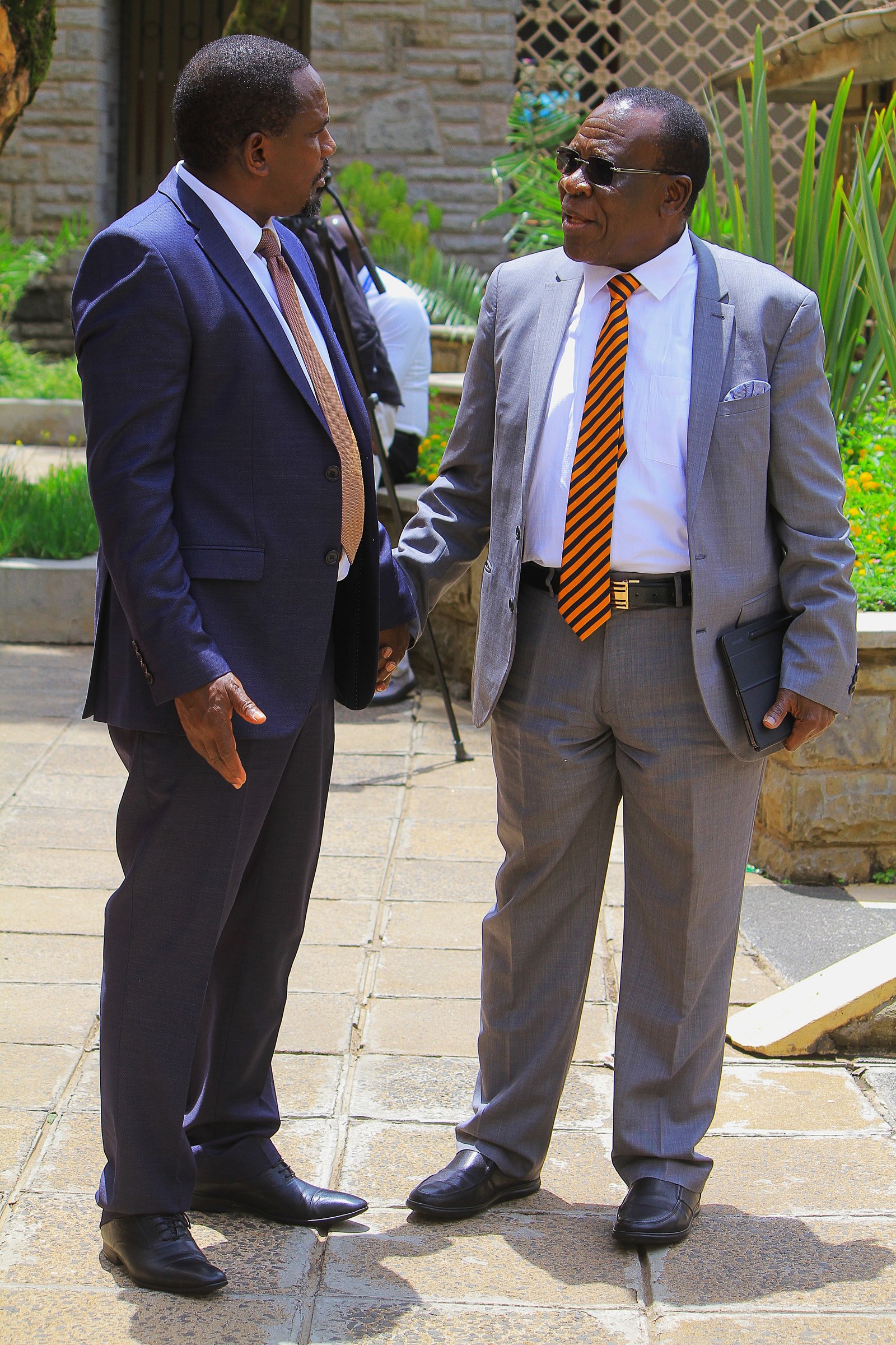 Johnson Manya Naicca with Elisha Odhiambo