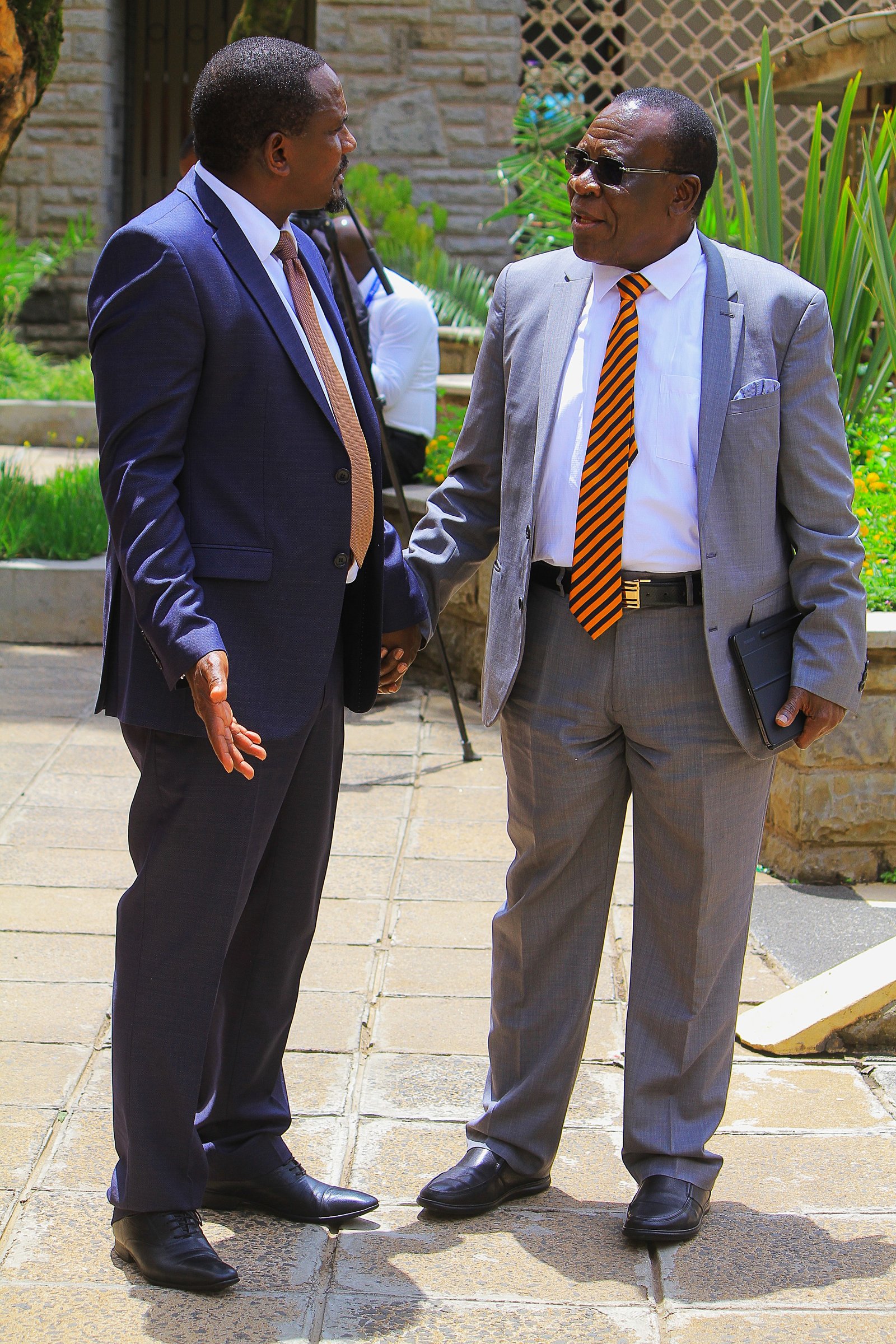 Johnson Manya Naicca with Elisha Odhiambo