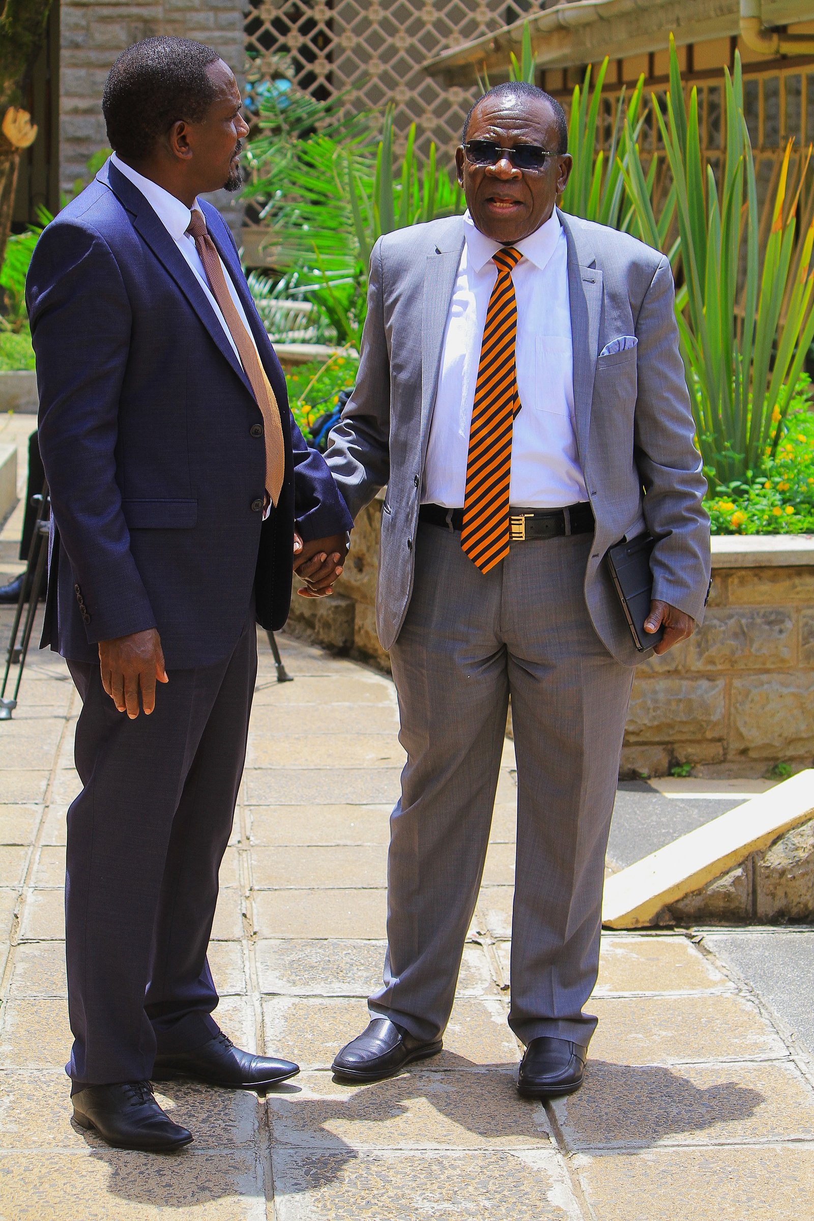 Johnson Manya Naicca with Elisha Odhiambo