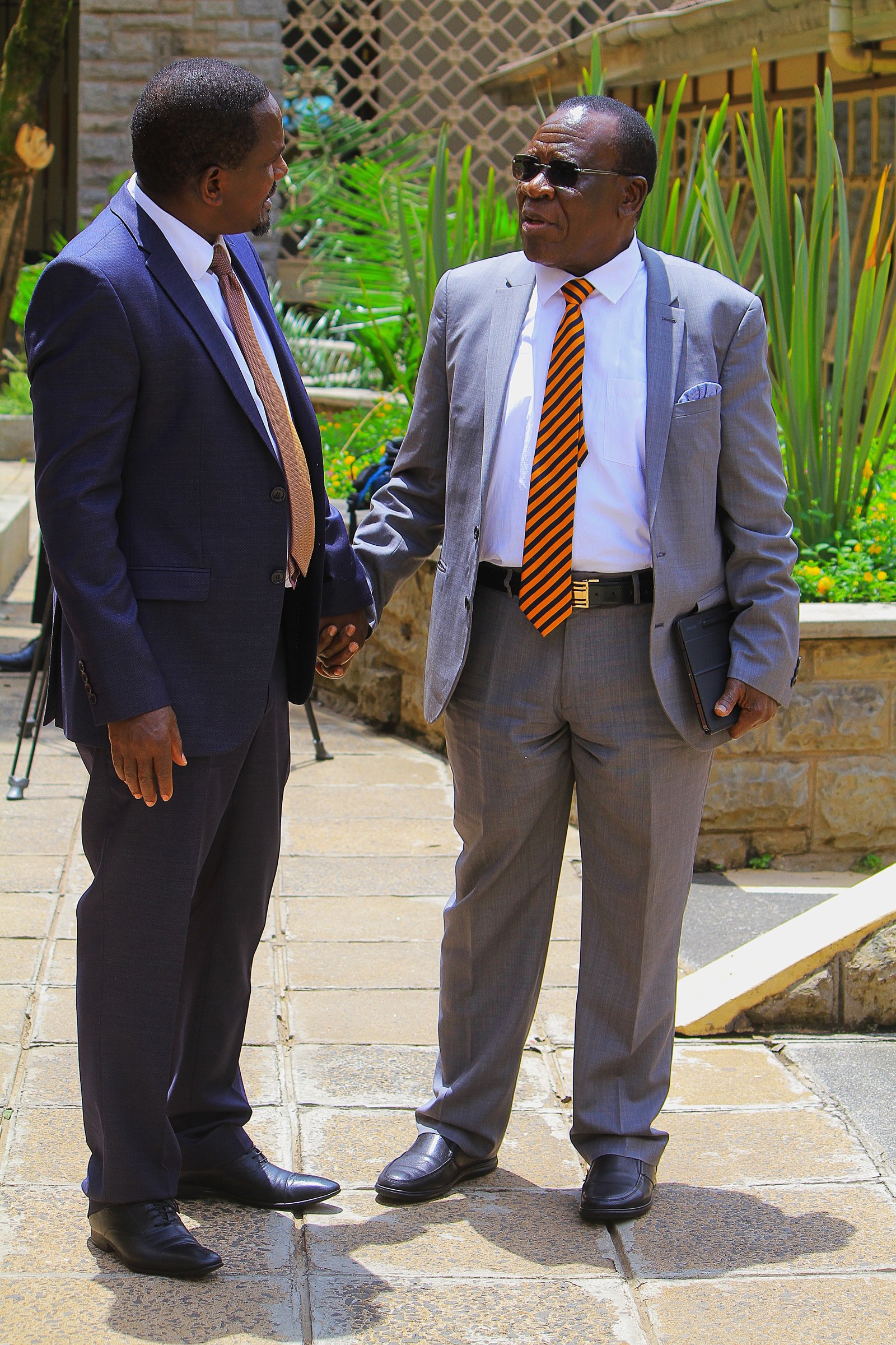Johnson Manya Naicca with Elisha Odhiambo
